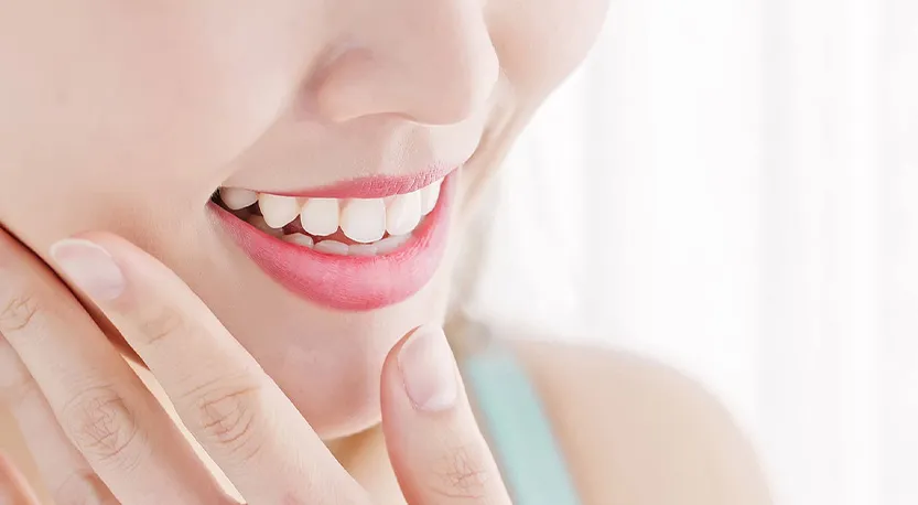 矯正治療後の女性